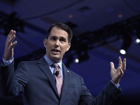 FILE - In this Feb. 23, 2017 file photo, Wisconsin Gov. Scott Walker speaks at the Conservative Political Action Conference (CPAC) in Oxon Hill, Md. Walker won the Republican primary in Wisconsin on Tuesday, Aug. 14, 2018, dispensing nominal opposition as he mounts bid for a third term.