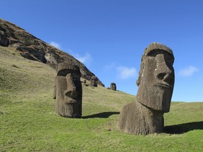 In this August 2012 file photo, statues of heads known as "Moais" stand at Rano Raraku, the quarry on Easter Island, Chile.