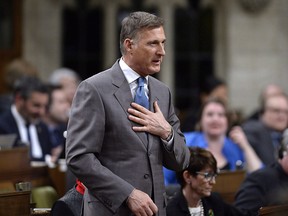 Maxime Bernier rises during Question Period in the House of Commons on Parliament Hill in Ottawa on Thursday, April 19, 2018. Bernier made the announcement in Ottawa on Thursday as Tories gathered in Halifax for a policy convention.