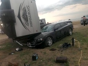 An overturned trailer is shown after a tornado at Margaret Bruce Beach, east of Alonsa, Man., on Friday, Aug.3, 2018. A tornado that touched down west of Lake Manitoba on Friday night tore at least one home off its foundation, a spokesman for Environment Canada said Saturday.