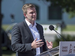 New Brunswick Premier Brian Gallant talks with reporters as the Canadian premiers meet in St. Andrews, N.B. on July 19, 2018. Campaigning in New Brunswick has unofficially begun, days before the writ drop that kicks off the official start of the election period. Liberal premier Brian Gallant launched his campaign Sunday, saying the party is campaigning on the themes of fairness and opportunity in their bid for re-election in the fall.