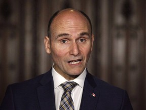 Social Development Minister Jean-Yves Duclos speaks at a press conference on Parliament Hill in Ottawa on Friday, May 25, 2018. Ottawa has announced $189 million for an employment insurance pilot project that provides seasonal workers with up to five more weeks of benefits. Minister of Families, Children and Social Development Jean-Yves Duclos made the announcement today at a fisheries plant in Escuminac, N.B.