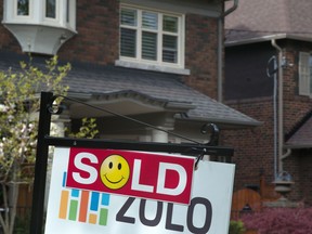 The Toronto Real Estate Board is studying ways to ensure Greater Toronto Area home sales data is "protected," even as realtors are rushing to publish the numbers in the wake of a precedent-setting court case. A sold sign is shown in front of west-end Toronto homes Sunday, May 14, 2017.