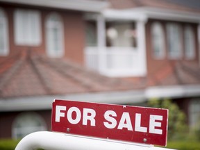 A real estate sign is pictured in Vancouver, B.C., Tuesday, June, 12, 2018. The Canadian Real Estate Association says home sales in July were up 1.9 per cent in July.