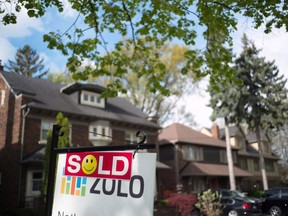 A sold sign is shown in front of west-end Toronto homes Sunday, May 14, 2017. The end might be near for a seven-year battle that has kept the public from easily finding out online what homes in the Greater Toronto Area sold for.THE CANADIAN PRESS/Graeme Roy