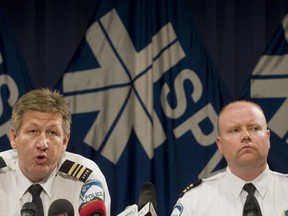 Denis Mainville, left, and Ian Lafreniere, of the Montreal police department, speak to reporters at a news conference in Montreal Tuesday, June 5, 2012 about the arrest of Luka Rocco Magnotta, who is the main suspect in the killing of Chinese student Jun Lin. Lafreniere, a high-profile Montreal police officer, is reportedly set to run for the Coalition avenir Quebec in a riding just south of Montreal.THE CANADIAN PRESS/Graham Hughes
