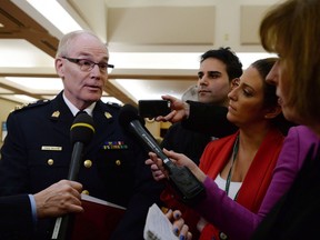 Clive Weighill of the Canadian Association of Chiefs of Police speaks to reporters in Ottawa on February 24, 2016. Saskatchewan has appointed a new chief coroner just two months after he did a review of its office. Former Saskatoon police chief Clive Weighill has been appointed to the position, which takes effect on Sept. 15.