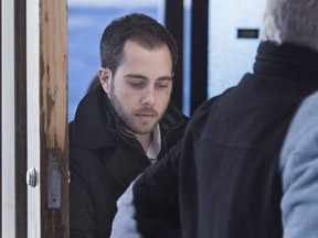 Christopher Calvin Garnier, charged with second-degree murder in the death of Truro police officer Const. Catherine Campbell, heads from Nova Supreme Court during a break in Halifax on December 20, 2017.