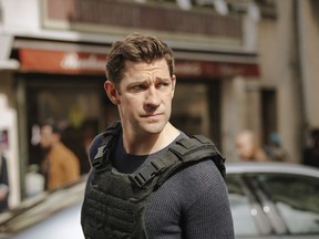 John Krasinski is shown in "Tom Clancy's Jack Ryan" in this undated handout photo. Over the past 25 years, some of the biggest names in Hollywood have played novelist Tom Clancy's CIA superhero Jack Ryan. From 1990's "The Hunt for Red October" through 2014's "Shadow Recruit," Alec Baldwin, Harrison Ford, Ben Affleck and Chris Pine all portrayed the office analyst-turned kick-ass anti-terrorist. That leaves big boots to fill for John Krasinski. The Boston-native steps into the ordinary hero role in the internationally-produced TV adaptation, "Tom Clancy's Jack Ryan." The eight episode series starts streaming Aug. 31 on Amazon Prime Video.