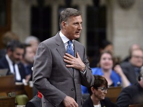 Conservative MP Maxime Bernier rises during Question Period in the House of Commons on Parliament Hill in Ottawa on Thursday, April 19, 2018. Aside from calling for an end to supply management in the dairy sector and privatizing Canada Post, the man dubbed "Mad Max" has a history of colourful, if not contentious, commentary.