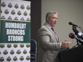 Humboldt Broncos President Kevin Garinger speaks during a media announcement for the hiring of the new Humboldt Broncos coach and General Manger Nathan Oystrick in Humboldt, Sask. Tuesday, July, 3, 2018. The man who became the public face of the Humboldt Broncos in the days after the hockey team's bus crashed in the spring has stepped down as president of the organization. Kevin Garinger told a club board meeting on Tuesday that he would not be seeking re-election as its president.