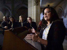 Justice Minister Jody Wilson-Raybould makes an announcement regarding family law on Parliament Hill in Ottawa on May 22, 2018. The federal justice minister says she will look at possible changes to a law forbidding jurors from talking about closed-door deliberations -- a secrecy provision that prevents stressed-out former jury members from discussing difficult trials with mental-health professionals. Jody Wilson-Raybould says she will pursue the matter -- and other jury-related issues -- with her provincial and territorial counterparts as part of the Liberal government's ongoing review of the criminal justice system.
