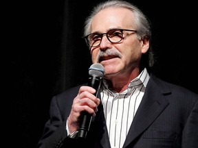 In this Jan. 31, 2014 photo, David Pecker, Chairman and CEO of American Media, addresses those attending the Shape & Men's Fitness Super Bowl Party in New York. American Media Inc. CEO and Donald Trump insider Pecker is stepping down as a director on the board of Canadian media giant Postmedia Network Canada Corp. THE CANADIAN PRESS/AP-Marion Curtis via AP)