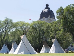 Teepees are seen at the Justice for Our Stolen Children camp near the Saskatchewan Legislative Building in Regina on Wednesday June 27, 2018.