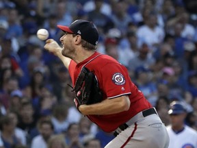 Washington Nationals starting pitcher Max Scherzer throws against the Chicago Cubs during the first inning of a baseball game Sunday, Aug. 12, 2018, in Chicago.
