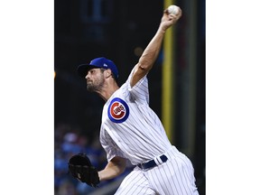 Chicago Cubs starting pitcher Cole Hamels (35) delivers during the second inning of a baseball game against the New York Mets on Tuesday, Aug. 28, 2018, in Chicago.