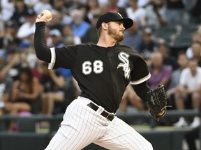 Chicago White Sox starting pitcher Dylan Covey (68) throws the ball against the New York Yankees during the first inning of a baseball game, Monday, Aug. 6, 2018, in Chicago.