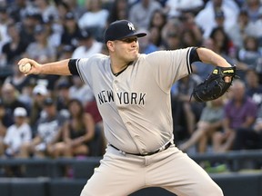 New York Yankees starting pitcher Lance Lynn (36) throws the ball against the Chicago White Sox during the first inning of a baseball game, Monday, Aug. 6, 2018, in Chicago.