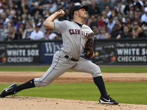 Cleveland Indians starting pitcher Trevor Bauer delivers against the Chicago White Sox during the first inning of a baseball game Saturday, Aug. 11, 2018, in Chicago.