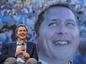 Conservative Leader Andrew Scheer is seen on stage while speaking to delegates at the Conservative national convention in Halifax on Saturday, August 25, 2018.