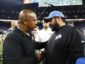 Cleveland Browns head coach Hue Jackson, left, meets with Detroit Lions head coach Matt Patricia after an NFL football preseason game, Thursday, Aug. 30, 2018, in Detroit.