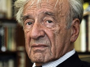 Elie Wiesel is photographed in his office in New York. Israel's Yad Vashem Holocaust Memorial says Elie Wiesel has died at 87. Romanian police on Saturday, Aug. 4, 2018 began an investigation after anti-Semitic graffiti appeared on the house of late Nobel laureate Elie Wiesel in northwest Romania. The probe was launched Saturday after comments were scrawled overnight on Wiesel’s small house, a protected historical monument_ in the town of Sighetu Marmatiei.