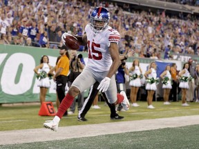 New York Giants wide receiver Hunter Sharp (15) reacts after scoring a touchdown against the New York Jets during the first quarter of an NFL football game, Friday, Aug. 24, 2018, in East Rutherford, N.J.