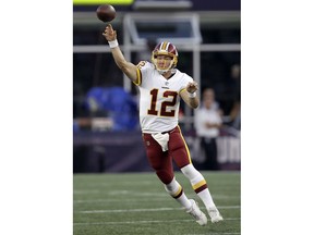 Washington Redskins quarterback Colt McCoy passes against the New England Patriots during the first half of a preseason NFL football game, Thursday, Aug. 9, 2018, in Foxborough, Mass.