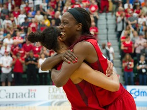 In this Aug. 16, 2015 file photo, Tamara Tatham celebrates Canada's win over Cuba in the gold-medal game at the FIBA Americas women's basketball championships in Edmonton.