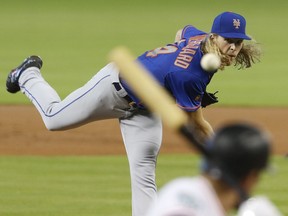 New York Mets starting pitcher Noah Syndergaard throws against the Miami Marlins in the first inning during their baseball game in Miami, Sunday, Aug. 12, 2018.