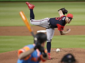 Atlanta Braves starting pitcher Mike Foltynewicz delivers during the first inning of the team's baseball game against the Miami Marlins, Friday, Aug. 24, 2018, in Miami.