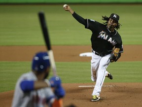 Miami Marlins' Jose Urena pitches to New York Mets' Amed Rosario during the first inning of a baseball game, Friday, Aug. 10, 2018, in Miami.