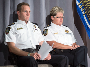 Fredericton Police Chief Leanne Fitch, right, and Deputy Chief Martin Gaudet at a news conference after two city police officers were among four people killed in a shooting on the city's north side on Aug. 10, 2018.