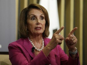House Minority Leader Nancy Pelosi gestures while speaking at the Public Policy Institute of California Wednesday, Aug. 22, 2018, in San Francisco.