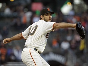 San Francisco Giants starting pitcher Madison Bumgarner works in the first inning of a baseball game against the Arizona Diamondbacks Tuesday, Aug. 28, 2018, in San Francisco.