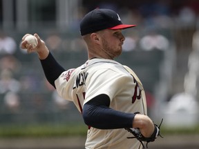 Atlanta Braves' Sean Newcomb pitches against the Milwaukee Brewers during the first inning of a baseball game Sunday Aug. 12, 2018, in Atlanta.