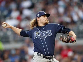 Tampa Bay Rays pitcher Ryne Stanek (55) works against the Atlanta Braves in the first inning of a baseball game Tuesday, Aug. 28, 2018, in Atlanta.