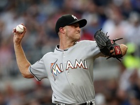 Miami Marlins starting pitcher Trevor Richards (63) works in the first inning of a baseball game against the Atlanta Braves Tuesday, Aug. 14, 2018 in Atlanta.