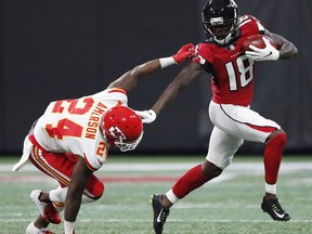 Atlanta Falcons wide receiver Calvin Ridley (18) runs by Kansas City Chiefs defensive back David Amerson (24) during the first half of an NFL preseason football game, Friday, Aug. 17, 2018, in Atlanta.