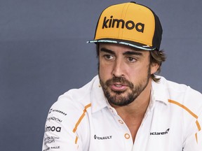 Mclaren driver Fernando Alonso of Spain speaks during a media conference ahead of the Belgian Formula One Grand Prix in Spa-Francorchamps, Belgium, Thursday, Aug. 23, 2018. The Belgian Formula One Grand Prix will take place on Sunday, Aug. 26, 2018.