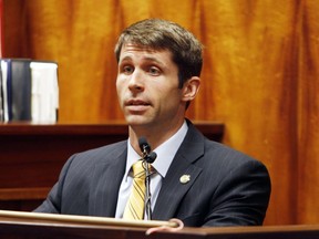 FILE - In this Aug. 6, 2013 file photo, U.S. State Department Special Agent Christopher Deedy testifies in court in Honolulu. Deedy, who shot and killed a man in a Hawaii fast-food restaurant cannot be tried a third time, a U.S. judge ruled Friday, Aug. 10, 2018. Deedy was in Honolulu for a 2011 international summit and was off-duty when he was shot Kollin Elderts during an altercation.