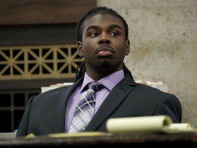 Defendant Micheail Ward listens during the trial for the fatal shooting of Hadiya Pendleton at the Leighton Criminal Court Building in Chicago on Tuesday, Aug. 21, 2018. Prosecutors played a videotape for jurors Tuesday, of an interrogation of a man who ultimately confessed to pulling the trigger in the fatal 2013 shooting of a 15-year-old Chicago honor student Hadiya Pendleton. On the video, Ward can be heard telling police how he fired into a park, aiming for who he believed were rival gang members. Ward is charged with first-degree murder, as is the alleged getaway driver, Kenneth Williams.