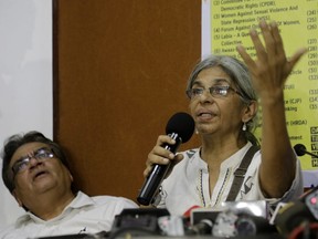 Advocate Susan Abraham speaks, as Advocate Mihir Desai sits beside her during a joint press conference opposing the arrests this week of five prominent rights activists for suspected links to Maoist rebels in various parts of the country, in Mumbai, India, Wednesday, Aug. 29, 2018. "All these people have a history of working to protect the rights of some of India's most poor and marginalized people. Their arrests raise disturbing questions about whether they are being targeted for their activism," said Aakar Patel, executive director of Amnesty International India.