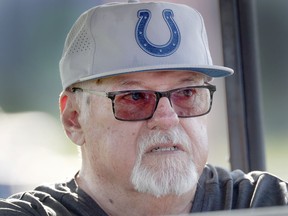 Bob Lamey watches the Indianapolis Colts NFL football team practice in Westfield, Ind., Thursday, Aug. 2, 2018. Longtime announcer Bob Lamey, who has announced his retirement as voice of the Indianapolis Colts, used a racial slur while retelling a story last week to a "friend." Lamey's attorney released a statement Wednesday morning, Aug. 22, 2018, acknowledging Lamey used "inappropriate" language during an off-the-air conversation last week and immediately apologized to those involved. (The Indianapolis Star via AP)