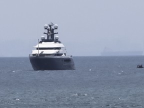 Luxury yacht "Equanimity" is anchored in the waters off Batam Island, Indonesia, Monday, Aug. 6, 2018. Malaysia's prime minister Mahathir Mohamad said Indonesia has handed over the luxury yacht allegedly bought with money stolen in the multibillion-dollar looting of a state investment fund.