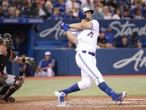 Kendrys Morales of the Toronto Blue Jays unleashes his power swing for one of his two homers on the night in a 5-3 win over the Baltimore Orioles in MLB action Monday at the Rogers Centre.