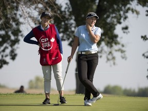Brooke Henderson of Canada and her sister Brittany are seen on the 9th green during the Pro-Am of the CP Women's Open in Regina, Wednesday, August, 22, 2018.