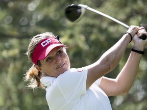 Lorie Kane, of Charlottetown, makes a shot off the 14th tee during the CP Women's Open in Regina, Thursday, August, 23, 2018.