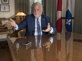 Quebec Premier Philippe Couillard during an interview Tuesday, August 7, 2018 in Quebec City.