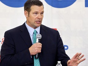 FILE - In this April 13, 2018, file photo, Kansas Secretary of State Kris Kobach speaks during a Republican gubernatorial debate in Atchison, Kan. Kobach is relying on his running mate to finance his campaign to unseat Kansas Gov. Jeff Colyer in the state's Republican primary. Campaign finance reports available online Tuesday, July 31, 2018, show that Kobach's choice for lieutenant governor, Wink Hartman, has loaned their campaign more than $1.5 million since April. It's the bulk of the $1.7 million raised by Kobach's campaign since the year started.
